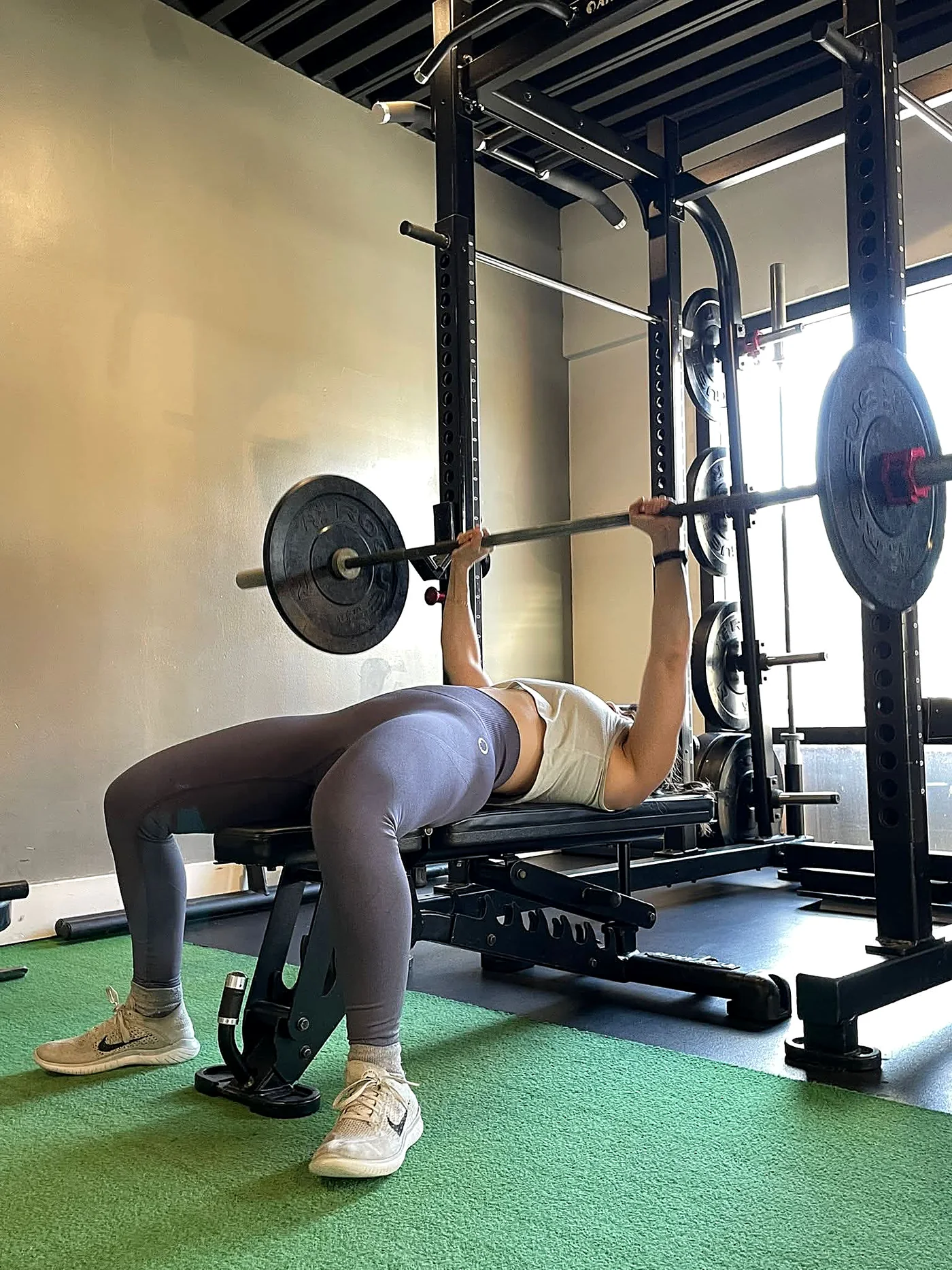Stephania Varalli bench pressing at OBF Gyms